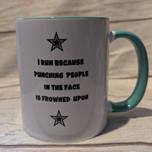 Load image into Gallery viewer, White mug with teal handle and humorous text on a wooden surface