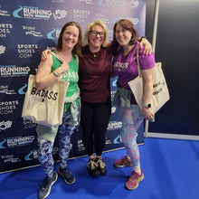 Load image into Gallery viewer, Helen, Helen Thorn and Beth posing together in front of a branded backdrop at an event.
