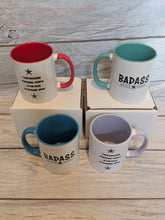 Load image into Gallery viewer, Four mugs with &#39;BADASS&#39; text and stars on a wooden surface
