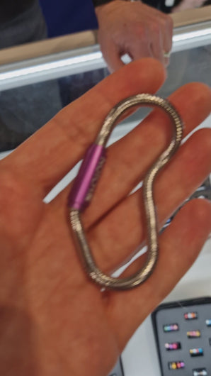 Notch signature bracelet moving smoothly in a woman's hand 